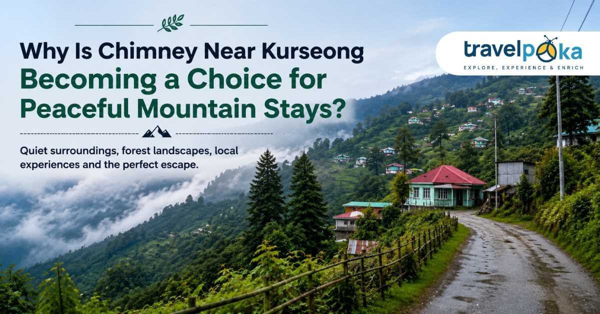 Misty mountain village near Kurseong with a winding road, forested hills, hillside homes, and peaceful scenery ideal for a relaxing stay.