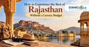 Rajasthan travel scene with Mehrangarh Fort, blue city, lake palace, and travel essentials representing budget-friendly Rajasthan travel.